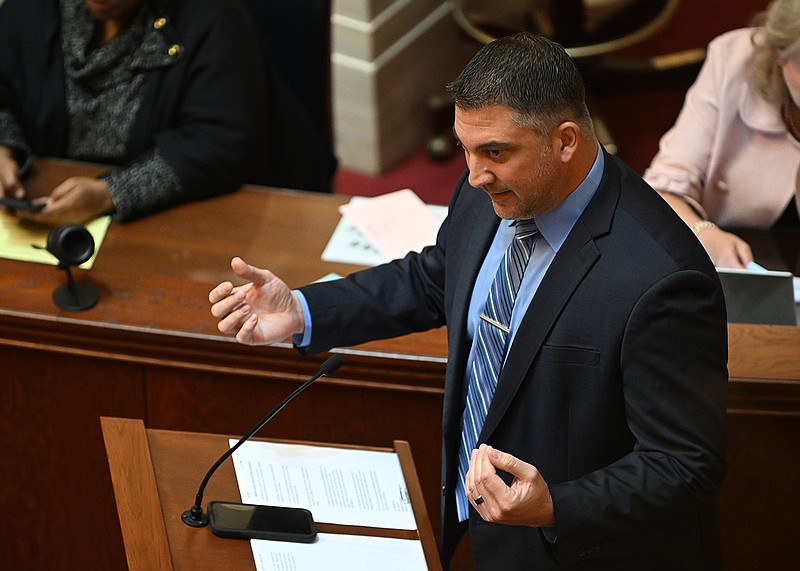 Sen. Clint Penzo, R-Springdale, answers questions about House Bill 1142, which is aimed at laying the groundwork for the construction of a recycling facility for spent nuclear fuel in Arkansas, during the Senate session Thursday at the state Capitol in Little Rock.
(Arkansas Democrat-Gazette/Staci Vandagriff)