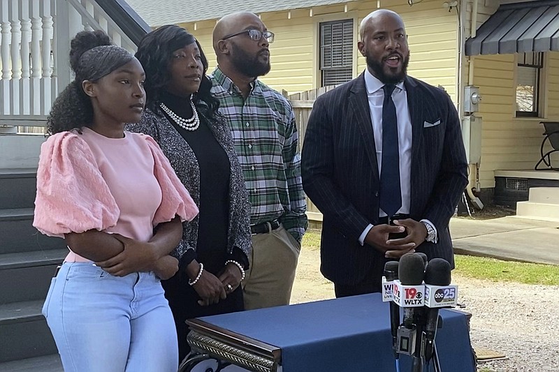 Marissa Barnwell, a River Bluff High School student, her parents and their lawyer, Tyler Bailey, hold a news conference in Columbia, S.C., on Thursday, March 9, 2023, regarding a lawsuit filed against Lexington School District One. Marissa said she was walking quietly to class and decided not to stop for the pledge or a moment of silence that followed. A teacher yelled at her, confronted her and pushed her against a wall. (Alexa Jurado/The State via AP)