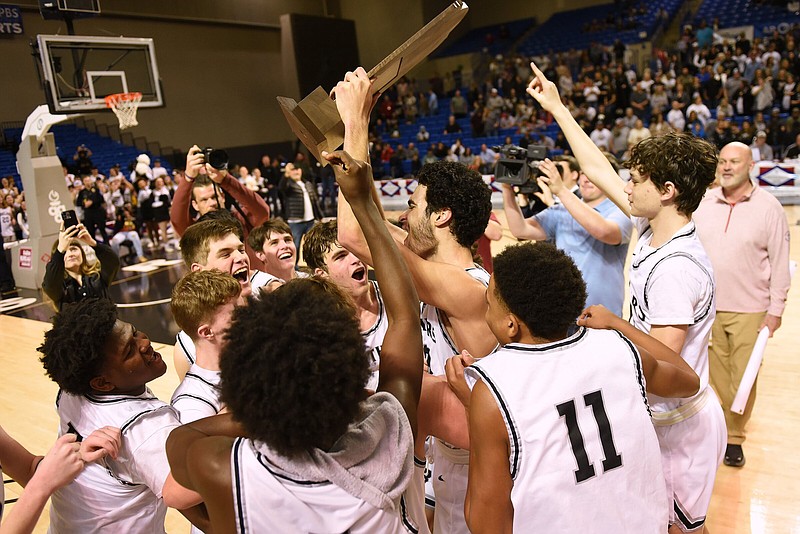 Bigelow players celebrate their 59-44 win over Marshall in the Class 2A boys state championship game Saturday at Bank OZK Arena in Hot Springs. More photos at arkansasonline.com/312boys2abb/.(Arkansas Democrat-Gazette/Staci Vandagriff)