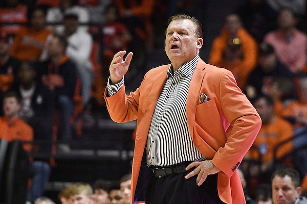 Illinois coach Brad Underwood watches during the second half of the team's NCAA college basketball game against Michigan State, Friday, Jan. 13, 2023, in Champaign, Ill. (AP Photo/Michael Allio)