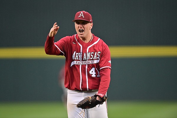 Arkansas pitcher Will McEntire reacts to the final out of a game against Louisiana Tech on Saturday, March 11, 2023, in Fayetteville.