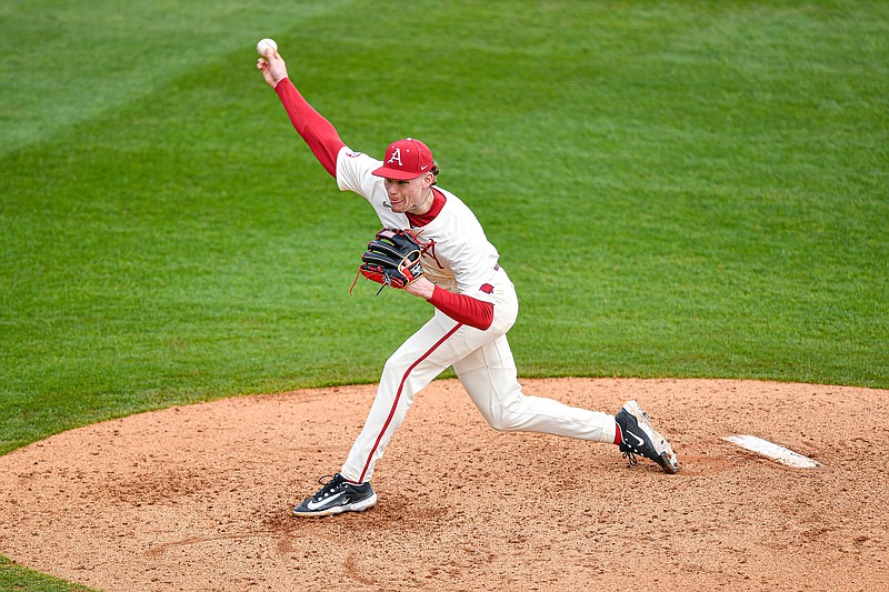 Arkansas relief pitcher Cody Adcock (49) delivers to the plate, Sunday, March 12, 2023, during the sixth inning of the Razorbacks’s 15-6 win over the Louisiana Tech Bulldogs at Baum-Walker Stadium in Fayetteville. Visit nwaonline.com/photo for today's photo gallery..(NWA Democrat-Gazette/Hank Layton)