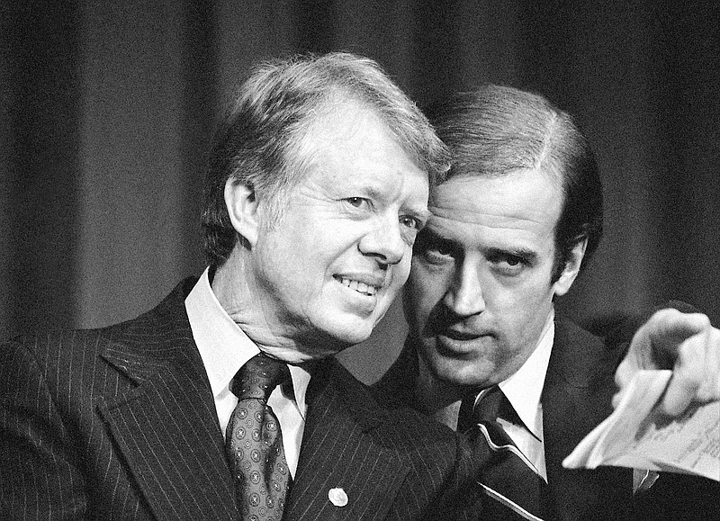 FILE - In this Feb. 20, 1978, file photo, President Jimmy Carter listens to Sen. Joseph R. Biden, D-Del., as they wait to speak at fund raising reception at Padua Academy in Wilmington, Del. President Joe Biden says he plans to deliver the eulogy at the funeral of former President Jimmy Carter, who remains under hospice care at his home in south Georgia. (AP Photo/Barry Thumma, File)