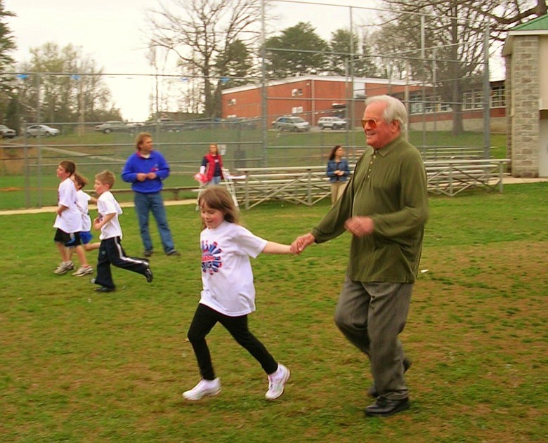 Contributed photo / Calvin Newton with granddaughter Samantha at a school Fun Run.