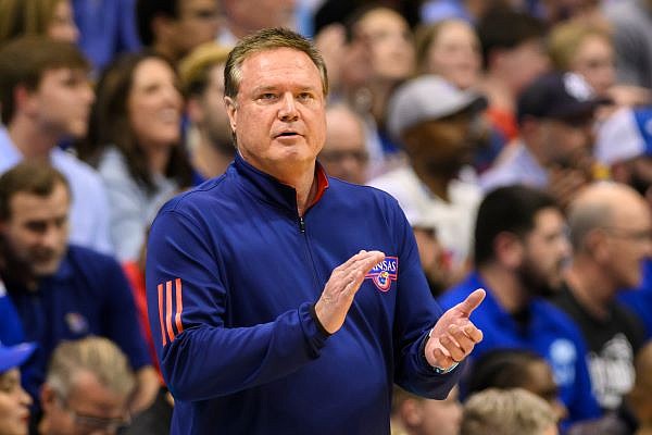 Kansas head coach Bill Self applauds his team's play against Texas Tech during the first half of an NCAA college basketball game in Lawrence, Kan., Tuesday, Feb. 28, 2023. (AP Photo/Reed Hoffmann) Kansas head coach Bill Self applauds his team's play against Texas Tech during the first half of an NCAA college basketball game in Lawrence, Kan., Tuesday, Feb. 28, 2023. (AP Photo/Reed Hoffmann)