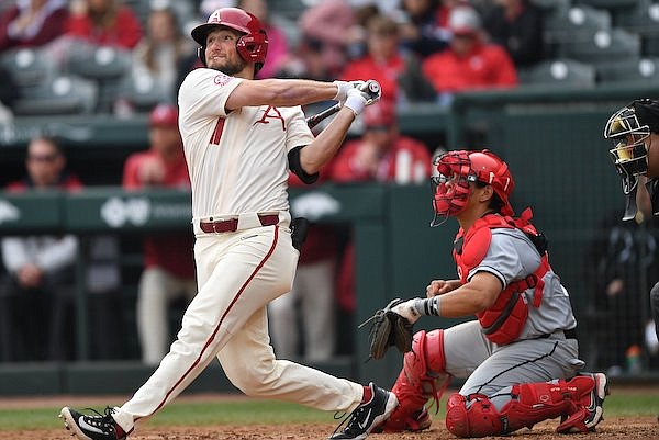 Arkansas left fielder Jared Wegner hits a home run during a game against UNLV on Wednesday, March 15, 2023, in Fayetteville.