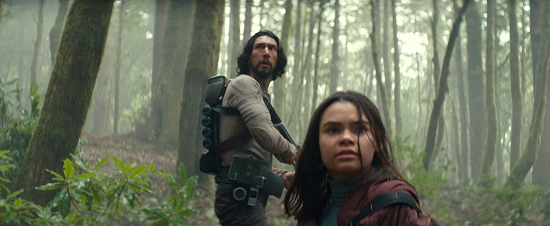 Back in time: Overworked space pilot Mills (Adam Driver) finds himself marooned on our Earth 65 million years ago with a little girl named Koa (Ariana Greenblatt) in the sci-fi thriller “65.”