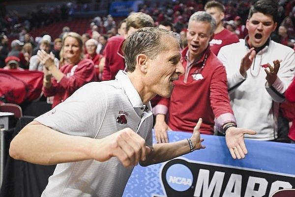 Arkansas coach Eric Musselman celebrates after the Razorbacks defeated Illinois 73-63 in the first round of the NCAA Tournament on Thursday, March 16, 2023, in Des Moines, Iowa.