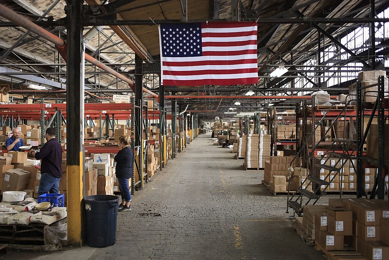 A U.S. flag adorns a warehouse at the Fiesta Tableware Co. factory in Newell, W.Va., in this file photo.
(Bloomberg WPNS)