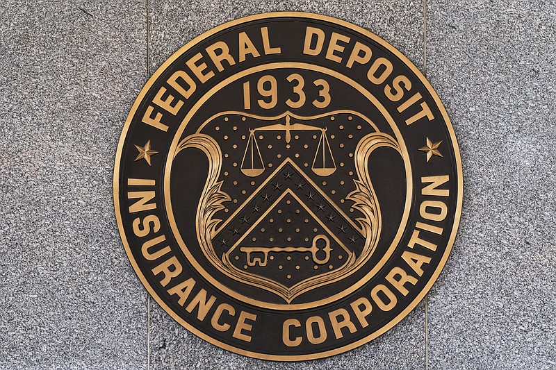 The Federal Deposit Insurance Corporation (FDIC) seal is shown outside its headquarters, Tuesday, March 14, 2023. (AP Photo/Manuel Balce Ceneta)