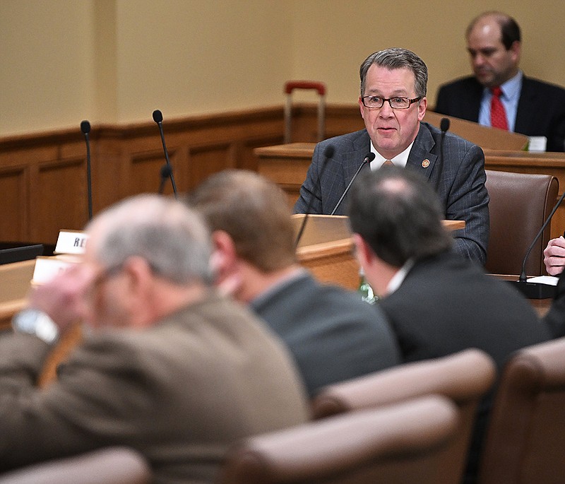 Rep. Carlton Wing, R-North Little Rock, speaks to the House Committee on Judiciary about House Bill 1521, which would create the criminal offense of disarming an officer, during a meeting Thursday at the state Capitol in Little Rock.
(Arkansas Democrat-Gazette/Staci Vandagriff)