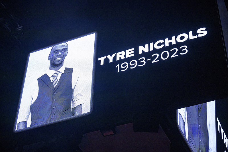 FILE - The screen at the Smoothie King Center in New Orleans honors Tyre Nichols before an NBA basketball game between the New Orleans Pelicans and the Washington Wizards, Jan. 28, 2023. (AP Photo/Matthew Hinton, File)