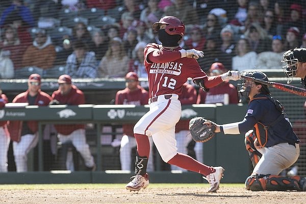 Arkansas center fielder Tavian Josenberger bats during a game against Auburn on Saturday, March 18, 2023, in Fayetteville.