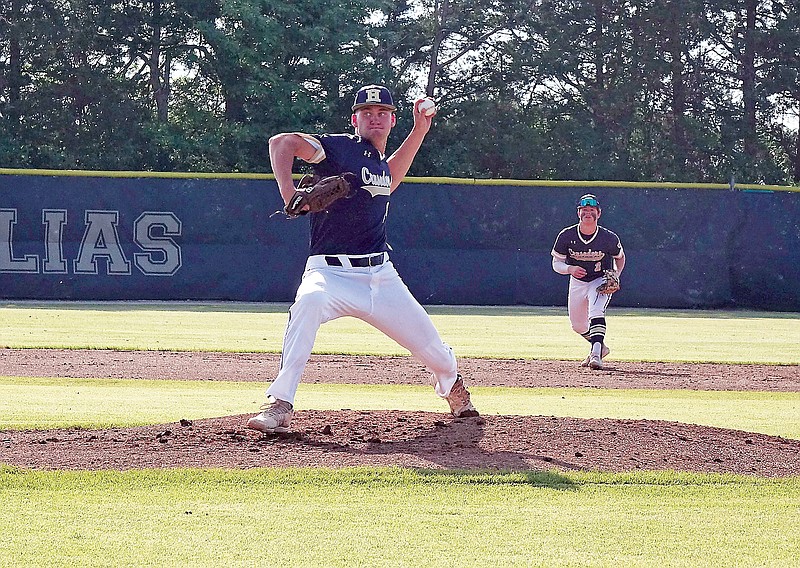 Nate Roark of Helias pitches during the Class 5 District 5 Tournament championship game against St. Francis Borgia last season at the American Legion Post 5 Sports Complex. (News Tribune file photo)