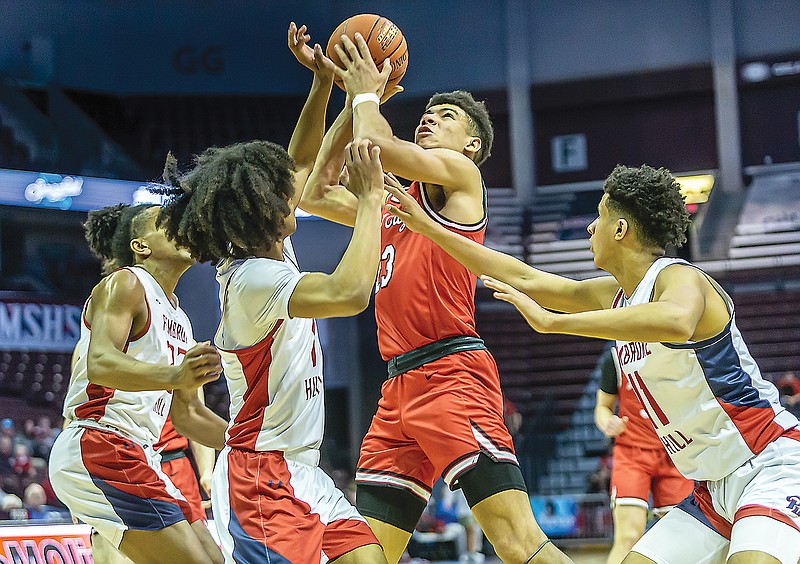 Jordan Martin of Jefferson City drives the lane Saturday during the Class 5 third-place game against Pembroke Hill at Great Southern Bank Arena in Springfield. (Gordon Radford/Special to the News Tribune)