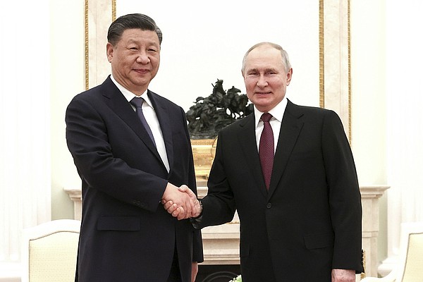 Putin hosts Xi in Moscow as  alliance grows