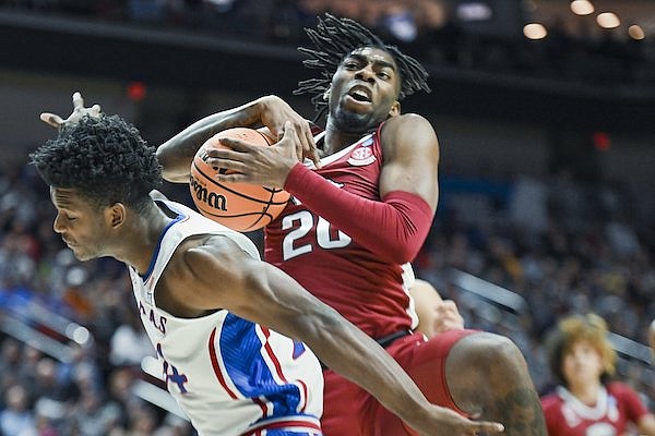 Arkansas forward Kamani Johnson (20) rebounds during an NCAA Tournament game against Kansas on Saturday, March 18, 2023, in Des Moines, Iowa.