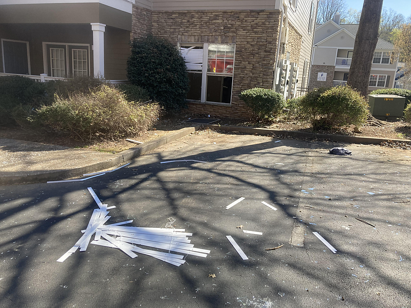 Chattanooga Fire Department photo / A chemical reaction caused a small explosion Monday at the Marina Pointe Apartments on Lake Resort Drive. The windows of one apartment unit were blown out. A worker resurfacing a bathtub in the unit was hospitalized with burns.