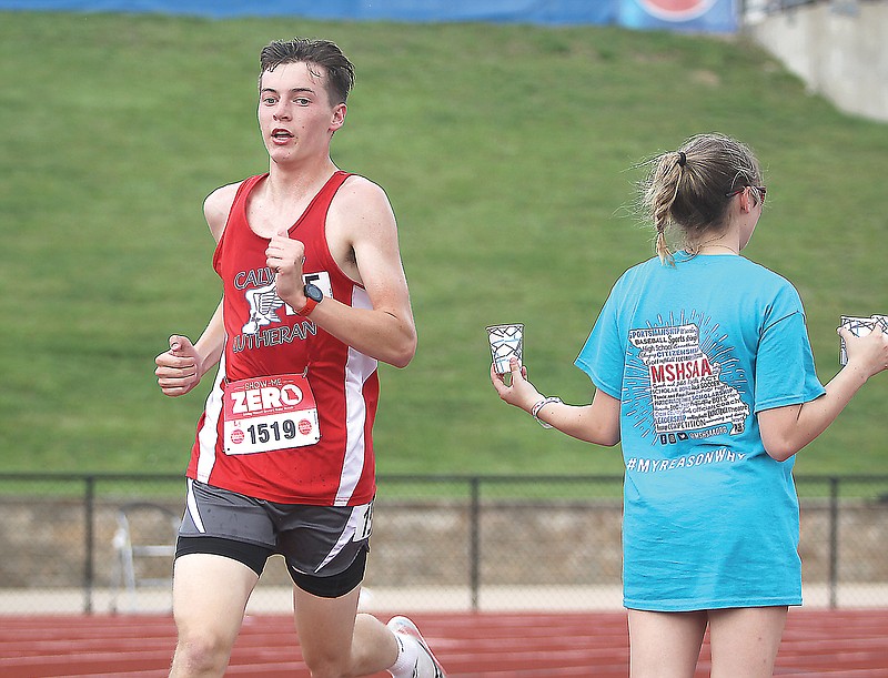 Calvary Lutheran’s Kyle Hagemeyer makes his way around the turn to begin another lap in the boys 3,200-meter run in last year’s Class 2 track and field state championships at Adkins Stadium. (Greg Jackson/News Tribune)