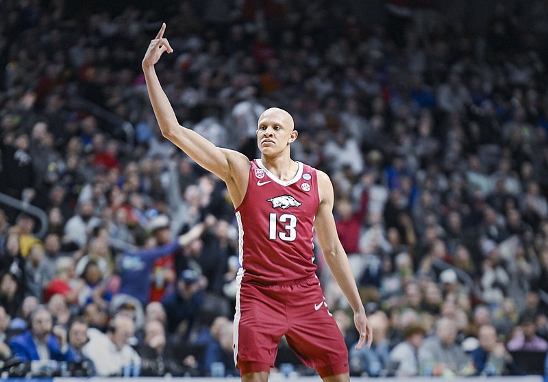 Arkansas guard/forward Jordan Walsh (13) reacts, Saturday, March 18, 2023 during the second half of the NCAA Division I Basketball Championship Second Round game at the Wells Fargo Arena in Des Moines, Iowa. Visit nwaonline.com/photos for today's photo gallery...(NWA Democrat-Gazette/Charlie Kaijo)