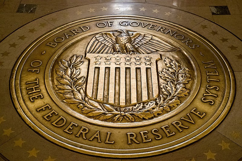 The seal of the Board of Governors of the United States Federal Reserve System is displayed in the ground at the Marriner S. Eccles Federal Reserve Board Building in Washington, Feb. 5, 2018. (AP Photo/Andrew Harnik, File)