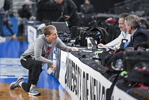 Arkansas coach Eric Musselman (left) speaks with the CBS broadcast team during an NCAA Tournament practice Wednesday, March 22, 2023, in Las Vegas.