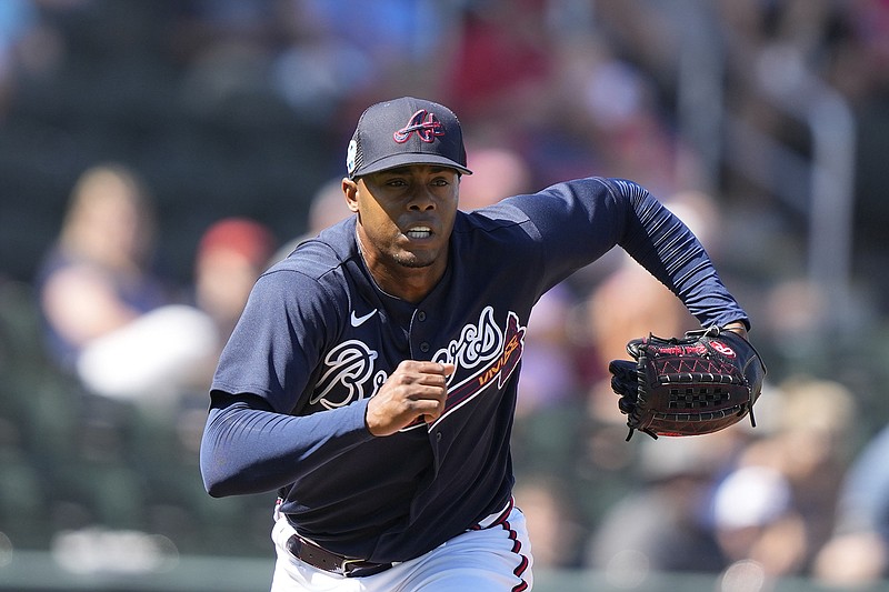 AP photo by Gerald Herbert / Atlanta Braves reliever Raisel Iglesias runs to cover first base on a groundout during a spring training exhibition game against the Minnesota Twins on March 4 in North Port, Fla.