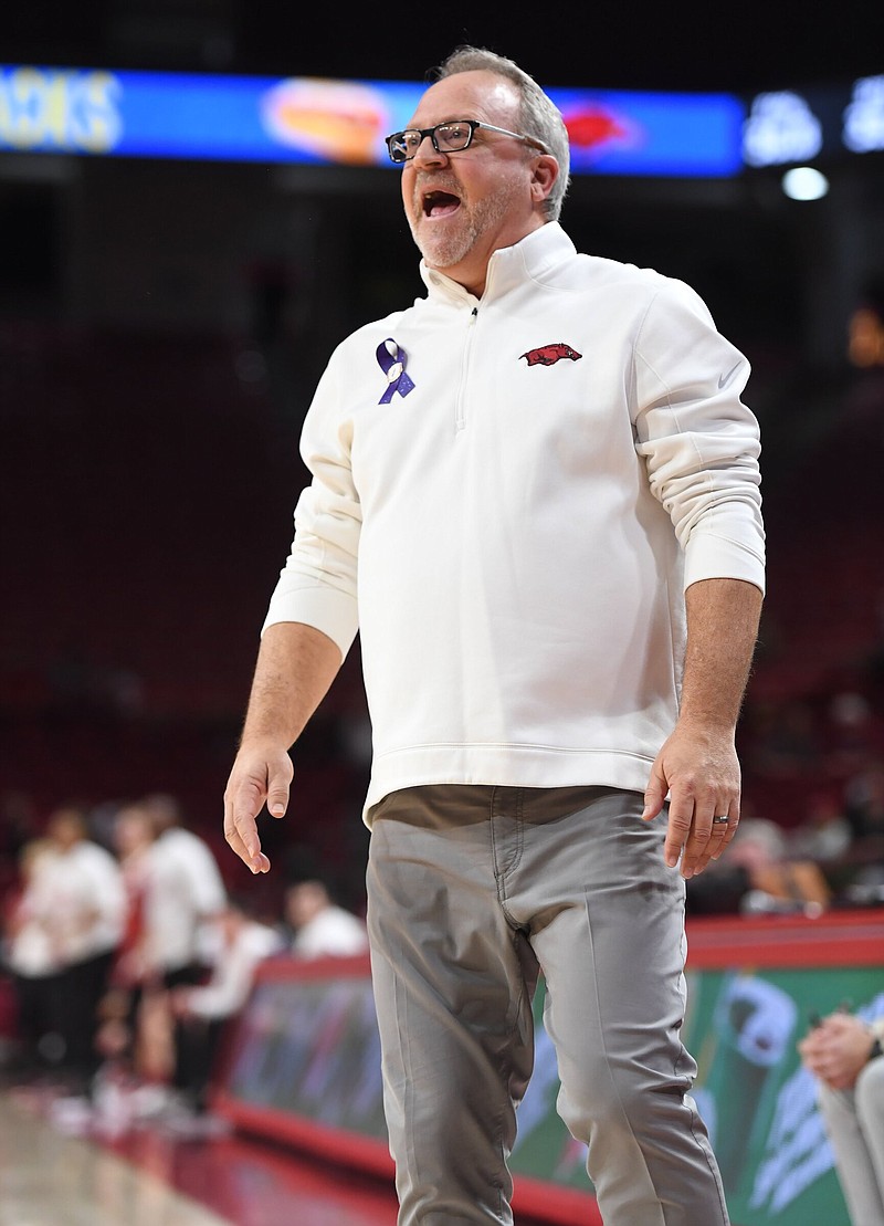 Arkansas coach Mike Neighbors directs his team Thursday, Jan. 26, 2023, during the second half of the Razorbacks' 69-66 loss to Alabama in Bud Walton Arena in Fayetteville.
(NWA Democrat-Gazette/Andy Shupe)