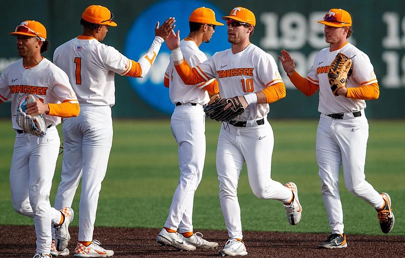 Tennessee Athletics photo / Tennessee's Griffin Merritt (10) and Christian Moore (1) exchange a high-five after a win over Morehead State earlier this month. The Vols are 16-6 heading into their weekend series against visiting Texas A&M but were 21-1 through 22 games last season.