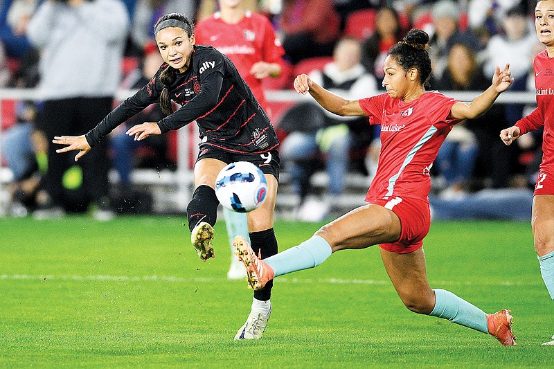 In this Oct. 29, 2022, file photo, Portland Thorns FC forward Sophia Smith passes the ball against Kansas City Current defender Addisyn Merrick during the NWSL championship match in Washington. (Associated Press)