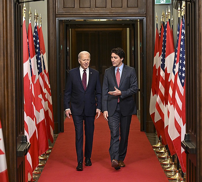 President Joe Biden and Canadian Prime Minister Justin Trudeau arrive to address the Canadian Parliament on Friday in Ottawa, Ontario. Earlier, Biden, Trudeau and top aides discussed issues facing both countries. More photos at arkansasonline.com/325uscanada/.
(The New York Times/Kenny Holston)