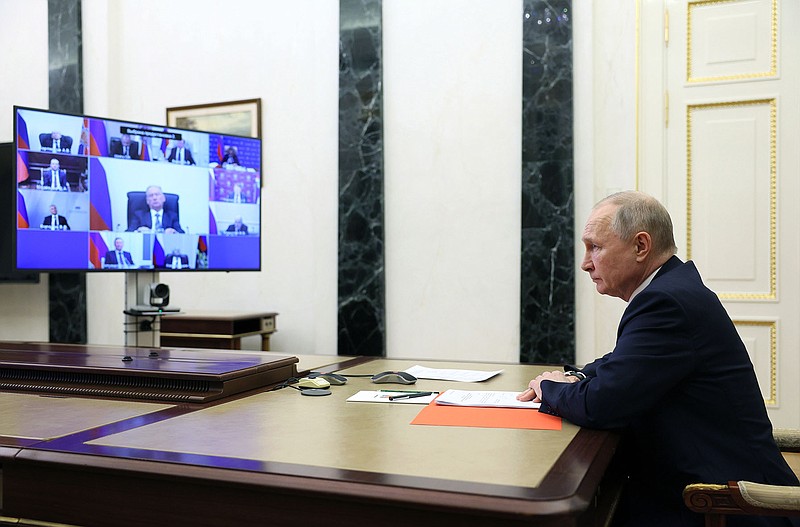 Russian President Vladimir Putin conducts a Security Council meeting via videoconference Friday in Moscow.
(AP/Sputnik/Gavriil Grigorov)