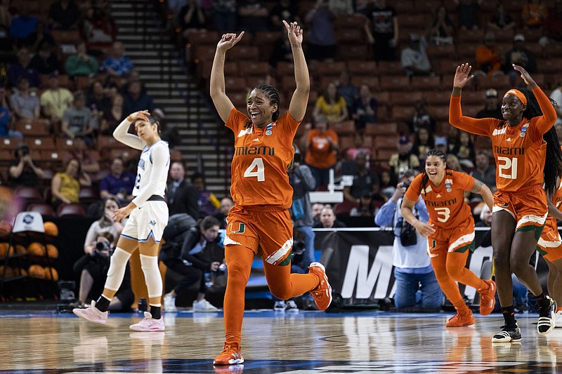 Miami's Jasmyne Roberts (4) runs after defeating Villanova in a Sweet 16 college basketball game of the NCAA Tournament in Greenville, S.C., Friday, March 24, 2023. 
(AP Photo/Mic Smith)