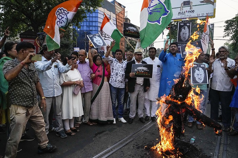 India’s opposition Congress party workers burn an effigy of Indian Prime Minister Narendra Modi during a protest Friday in Kolkata, India.
(AP/Bikas Das)