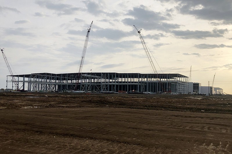 Construction continues on the plant, part of a $5.6 billion joint project by Ford Motor Co. and battery maker SK on Friday, March 24, 2023 in Stanton, Tenn.  Ford says its new assembly plant being built in western Tennessee will be able to build up to 500,000 electric pickup trucks per year at full production. (AP Photo/ Adrian Sainz)