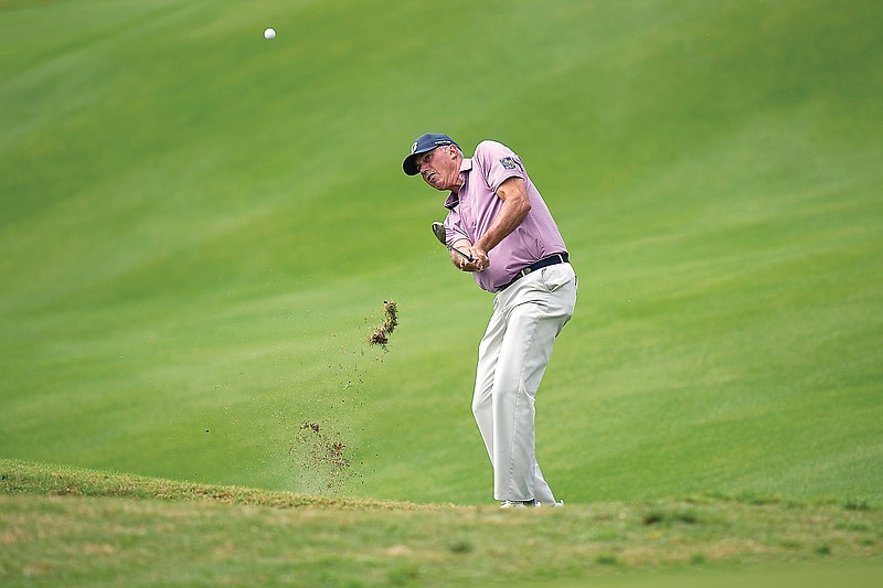 Matt Kuchar hits to the sixth green during Friday’s pool play of the Match Play Championship in Austin, Texas. (Associated Press)