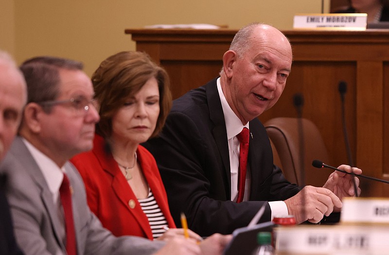 Arkansas state Rep. Bruce Cozart (right), R-Hot Springs, asks a question during a meeting of the House Committee on Education at the state Capitol in Little Rock in this Feb. 14, 2023 file photo. (Arkansas Democrat-Gazette/Colin Murphey)