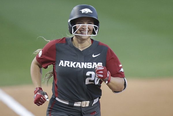 Arkansas' Hannah Gammill runs the bases after hitting a home run during an NCAA super regional game against Arizona on Friday, May 28, 2021, in Fayetteville.
