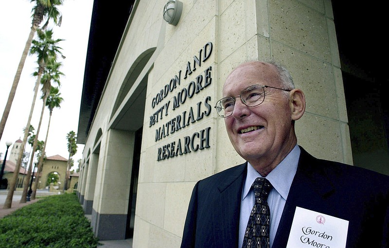 FILE - Intel Corp. founder and chairman emeritus, Gordon Moore, smiles as he tours during the dedication of the new Gordon and Betty Moore Material Research building at Stanford University on the Stanford, Calif., campus, Wednesday, Oct. 11, 2000. (AP/Paul Sakuma, File)