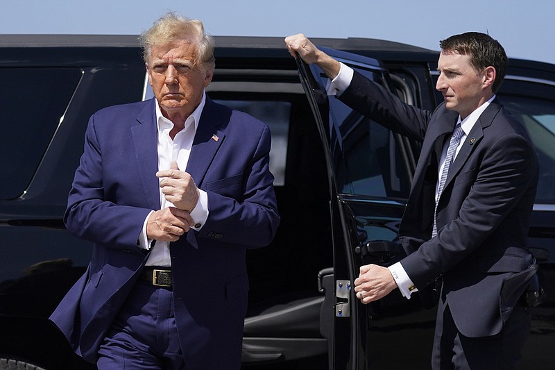 Former President Donald Trump arrives at West Palm Beach International Airport in West Palm Beach, Fla., on Saturday, March 25, 2023, to board his airplane for a trip to a campaign rally in Waco, Texas. (AP/Evan Vucci)