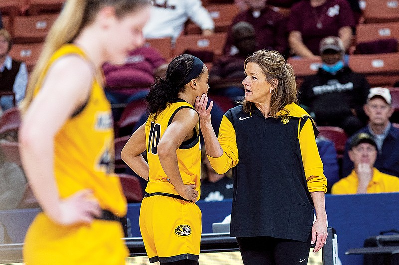 Missouri coach Robin Pingeton speaks with Katlyn Gilbert during a Southeastern Conference Tournament game against Arkansas earlier this month in Greenville, S.C. (Associated Press)