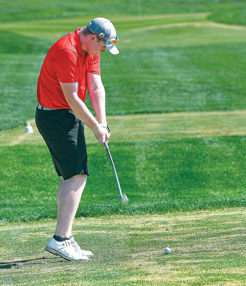 Jefferson City's Caleb Tuller tees off during last year’s Central Missouri Activities Conference Tournament at Jefferson City Country Club. (Julie Smith/News Tribune)