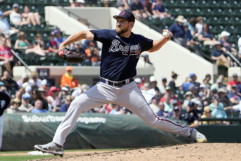 Atlanta Braves relief pitcher Dylan Lee throws against the Detroit Tigers in the fourth inning of a spring training baseball game, Wednesday, March 22, 2023, in Lakeland, Fla. (AP Photo/John Raoux)
