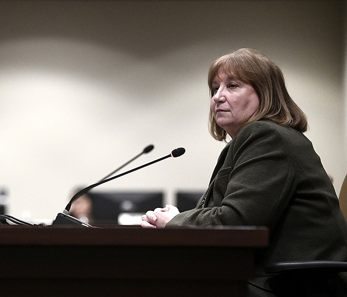 Rep. Frances Cavenaugh, R-Walnut Ridge, introduces House Bill 1616, which would amend the law to allow counties and municipalities to post election notices on a website rather than in local newspapers, during a meeting of the House Committee on City, County and Local Affairs at the state Capitol in Little Rock on Wednesday.
(Arkansas Democrat-Gazette/Stephen Swofford)