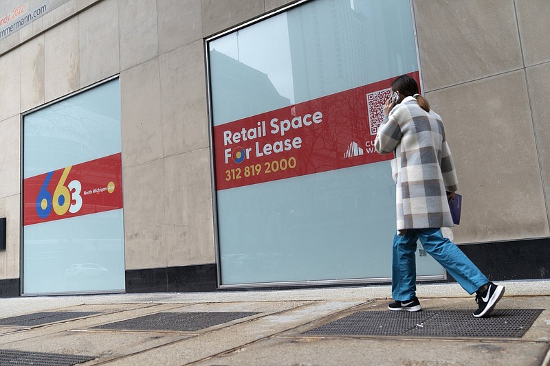 A pedestrian passes a vacant retail space on Michigan Avenue last week in Chicago. Retail sales are expected to continue to rebound from the effects of the covid-19 pandemic, The National Retail Federation said Wednesday.
(AP/Erin Hooley)