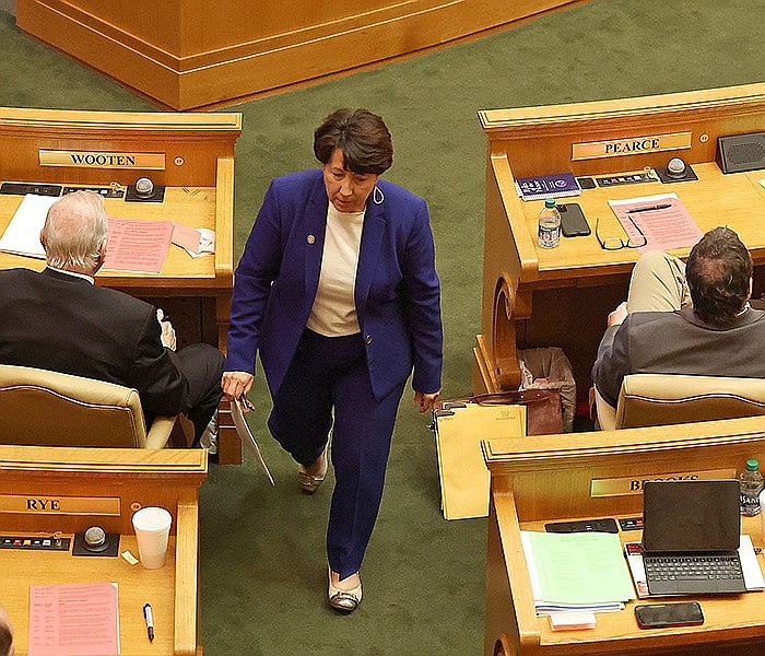 Rep. Mary Bentley, R-Perryville, returns to her seat after listening to debate about SB307 on the floor of the House of Representatives at the Arkansas state Capitol on Tuesday, March 14, 2023. (Arkansas Democrat-Gazette/Colin Murphey)