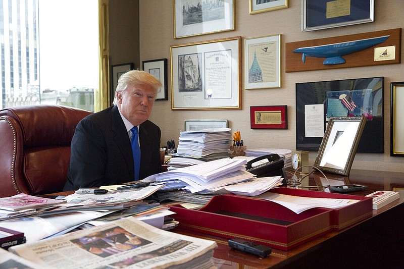 Then-Republican presidential candidate Donald Trump is photographed during an interview with The Associated Press in his office at Trump Tower in New York in this May 10, 2016 file photo. (AP/Mary Altaffer)