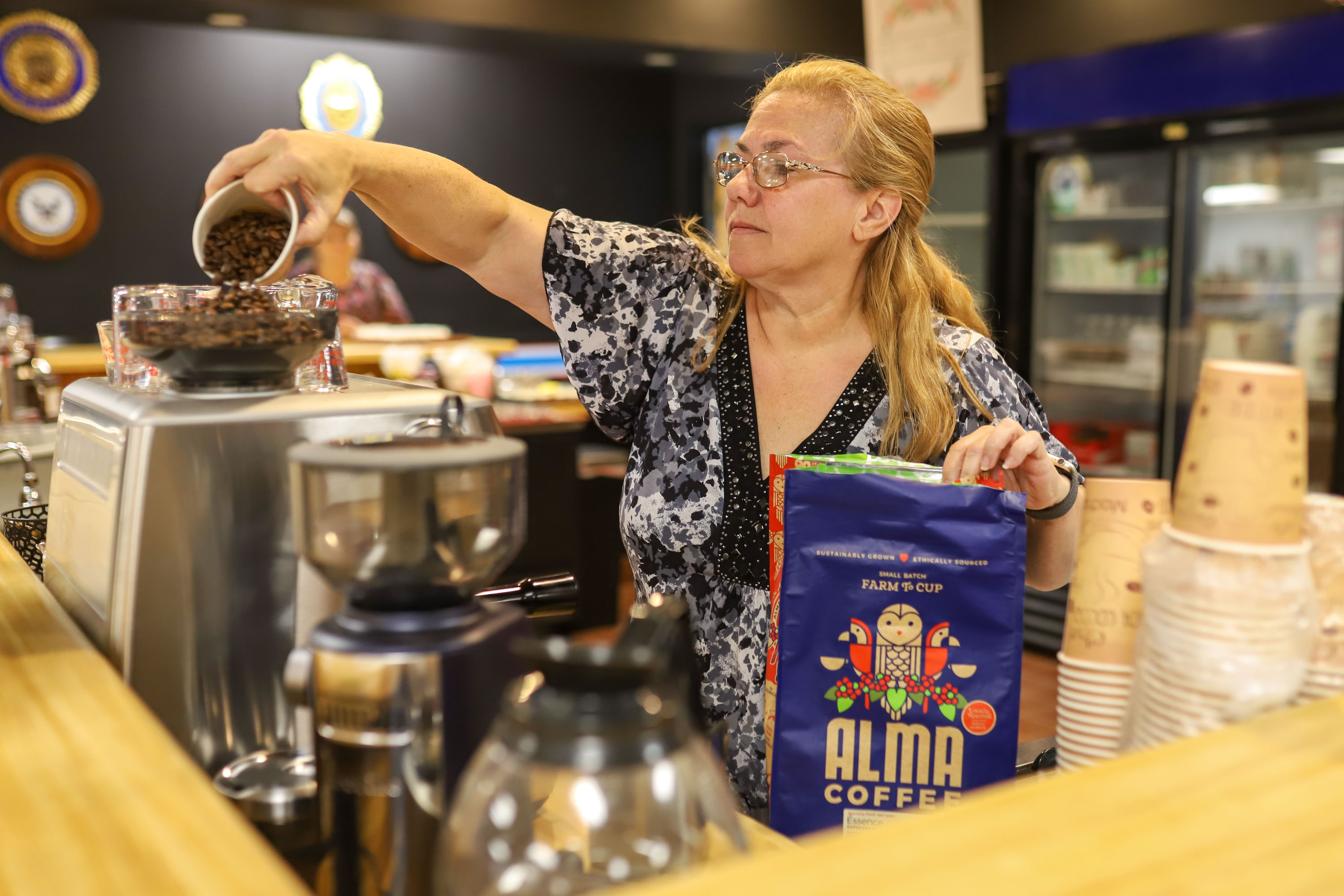 Staff photo by Olivia Ross / Barista Zel Haag prepares an order. The American Legion added a coffee shop, Legion Cafe, to its space as seen on Wednesday, March 29, 2023.