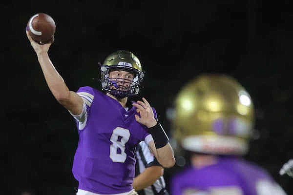 Central Arkansas Christian quarterback Grayson Wilson throws a pass during a game against Benton Harmony Grove on Friday, Sept. 16, 2022, in North Little Rock.