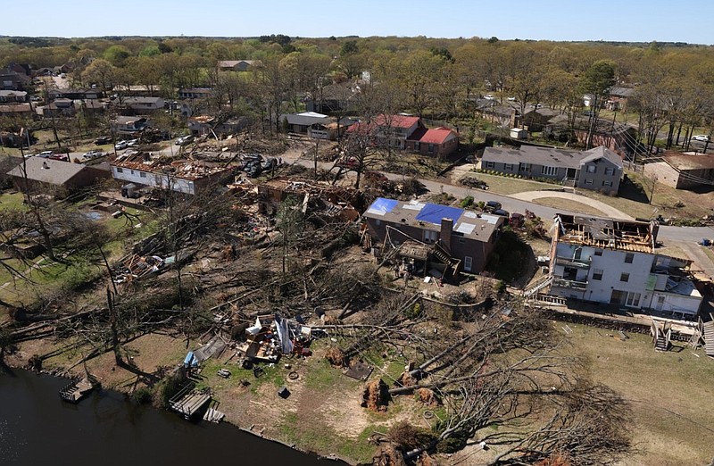 Damage to buildings in North Little Rock can be seen in this Saturday, April 1, 2023 aerial photo after a tornado swept through the area on Friday. The Arkansas Democrat-Gazette was offered an opportunity to see the damage by helicopter by Medic Corps, a nonprofit organization that assists in disasters. (Arkansas Democrat-Gazette/Colin Murphey)